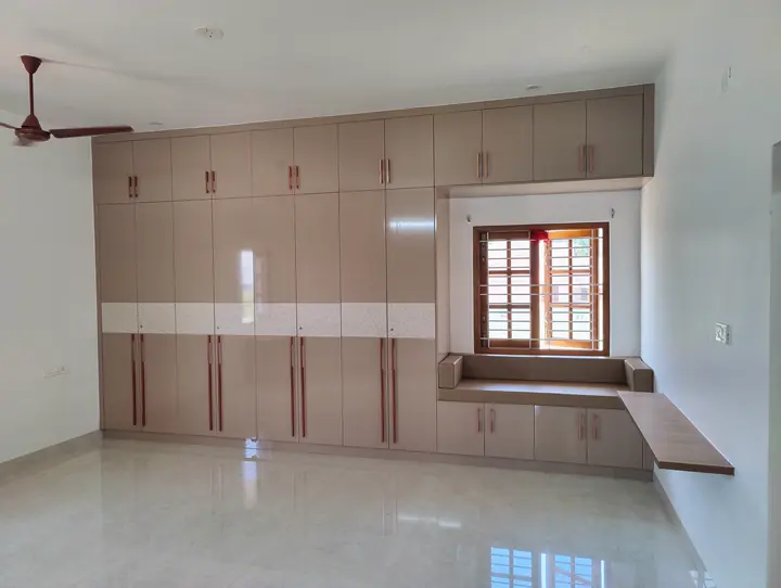 Residence Five's full-height wardrobe and window-side desk